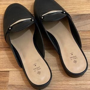 Black slip on shoes / mules with gold accent